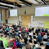 Vortragspublikum und Referent